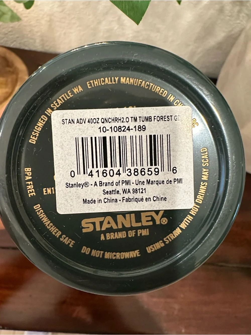Stanley Dark Green Travel Mug with Gold Trim and Geometric Accent